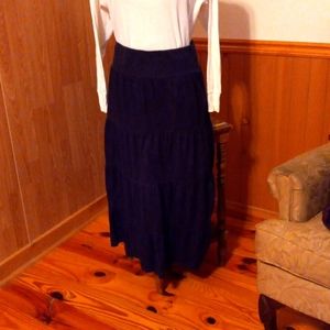 Layered long ruffled skirt.